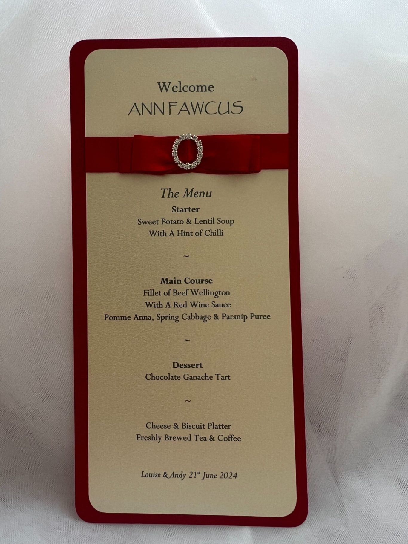 Personalised menu card on red and ivory