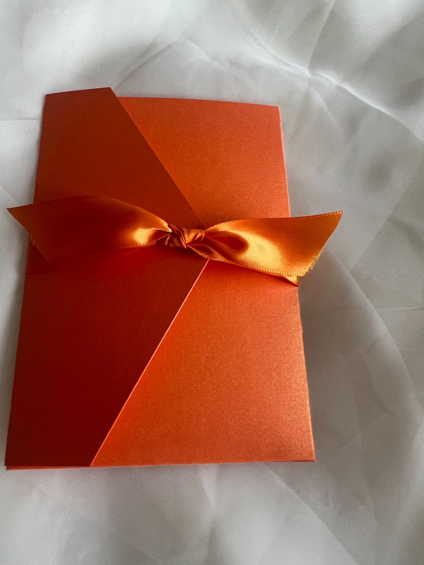 Pocketfold with ribbon belly band £4.50, includes guest information card and reply card/envelope. Additional information card 25p