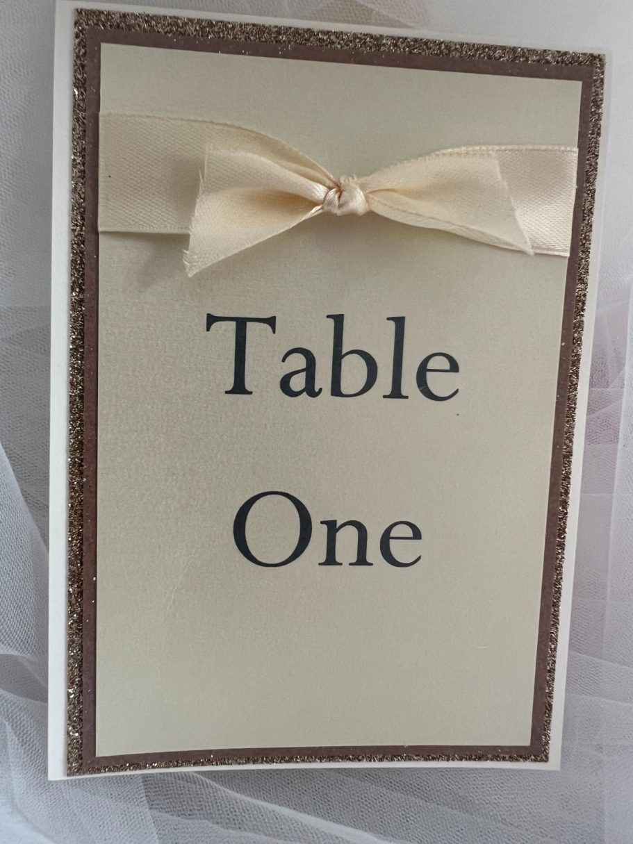 Decadence Collection in gold glitter with ivory satin ribbon