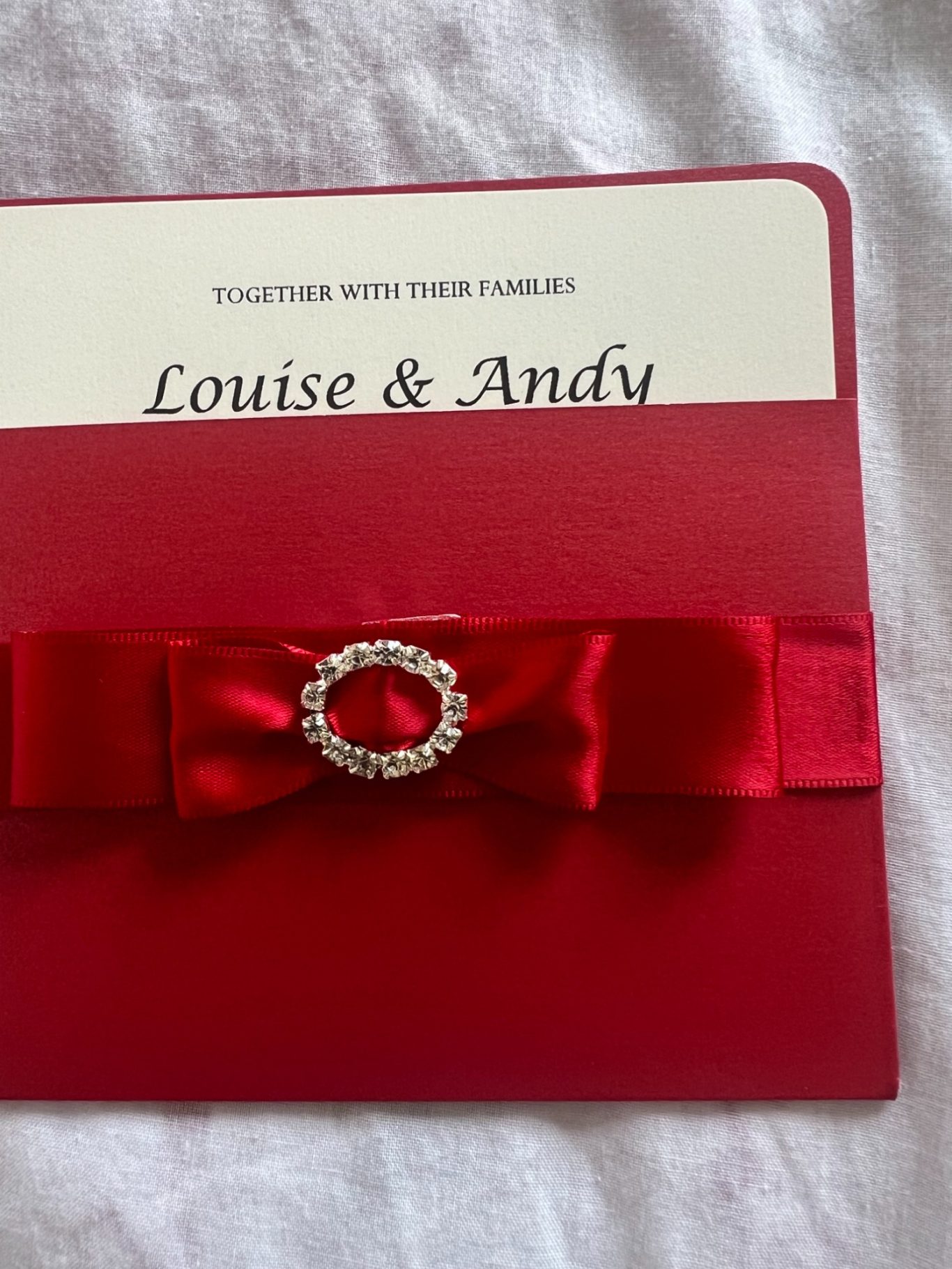 Pocket in pearlised red with deep red satin ribbon